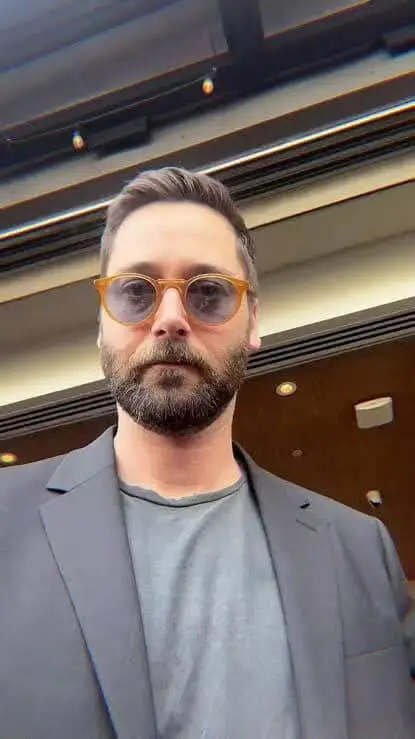 ai character: Ryan James Eggold  background