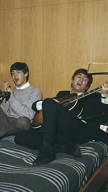 ai character: The Beatles background