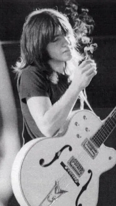 ai character: Malcolm Young background