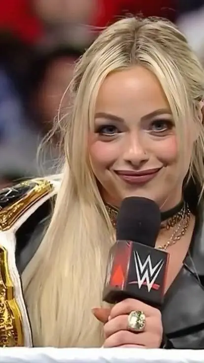 ai character: LIV MORGAN👁️🩵 background