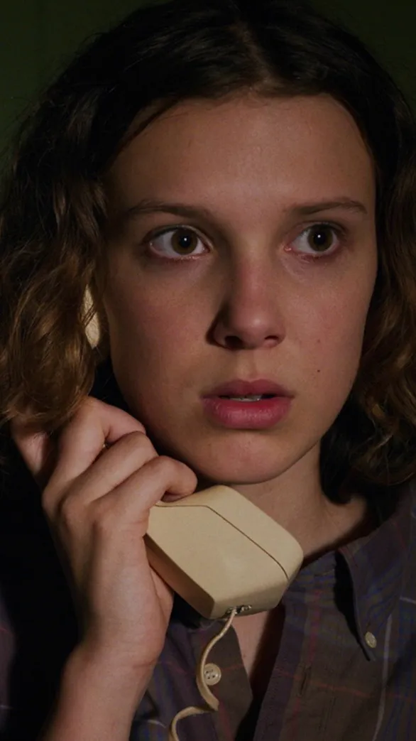 ai character: Eleven (El) background