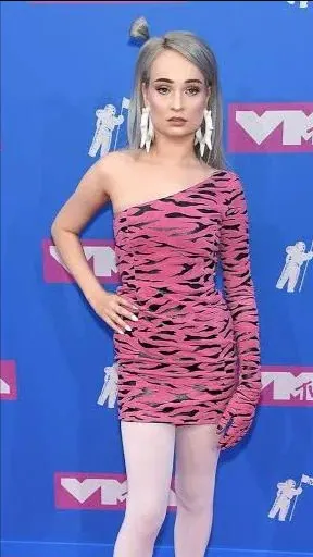 ai character: Kim petras  background