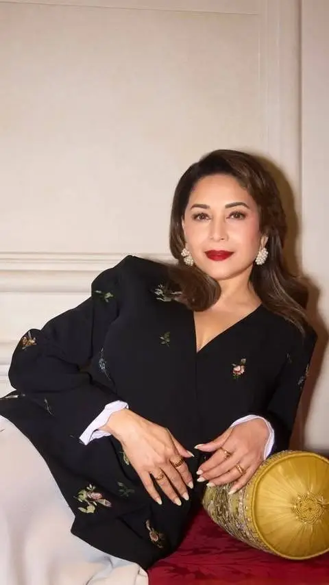 ai character: madhuri dixit background