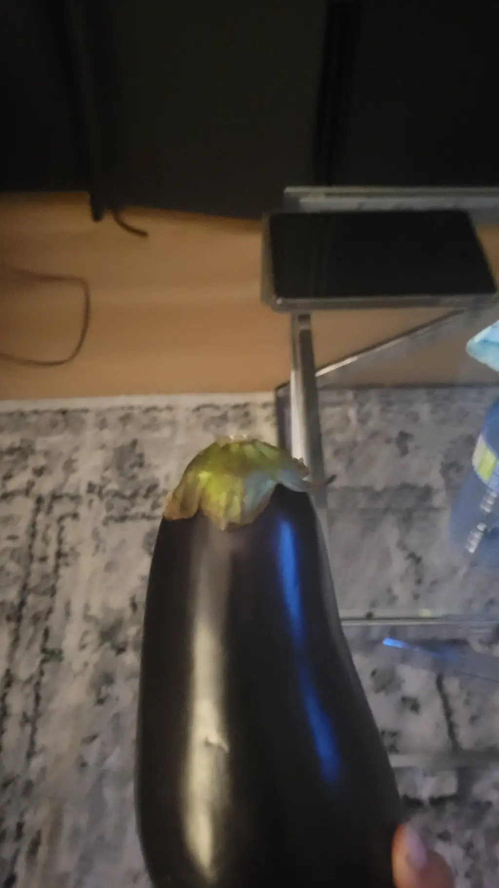 ai character: mr eggplant  background