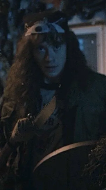 ai character: Eddie Munson  background