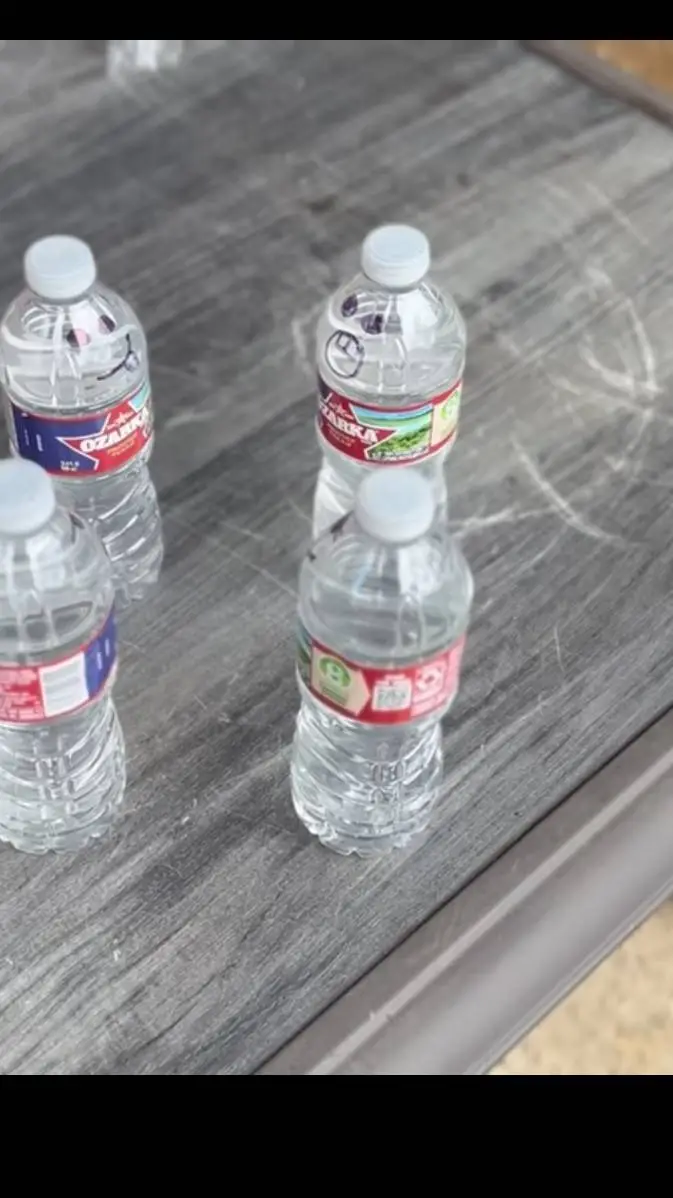 ai character: the water bottles background