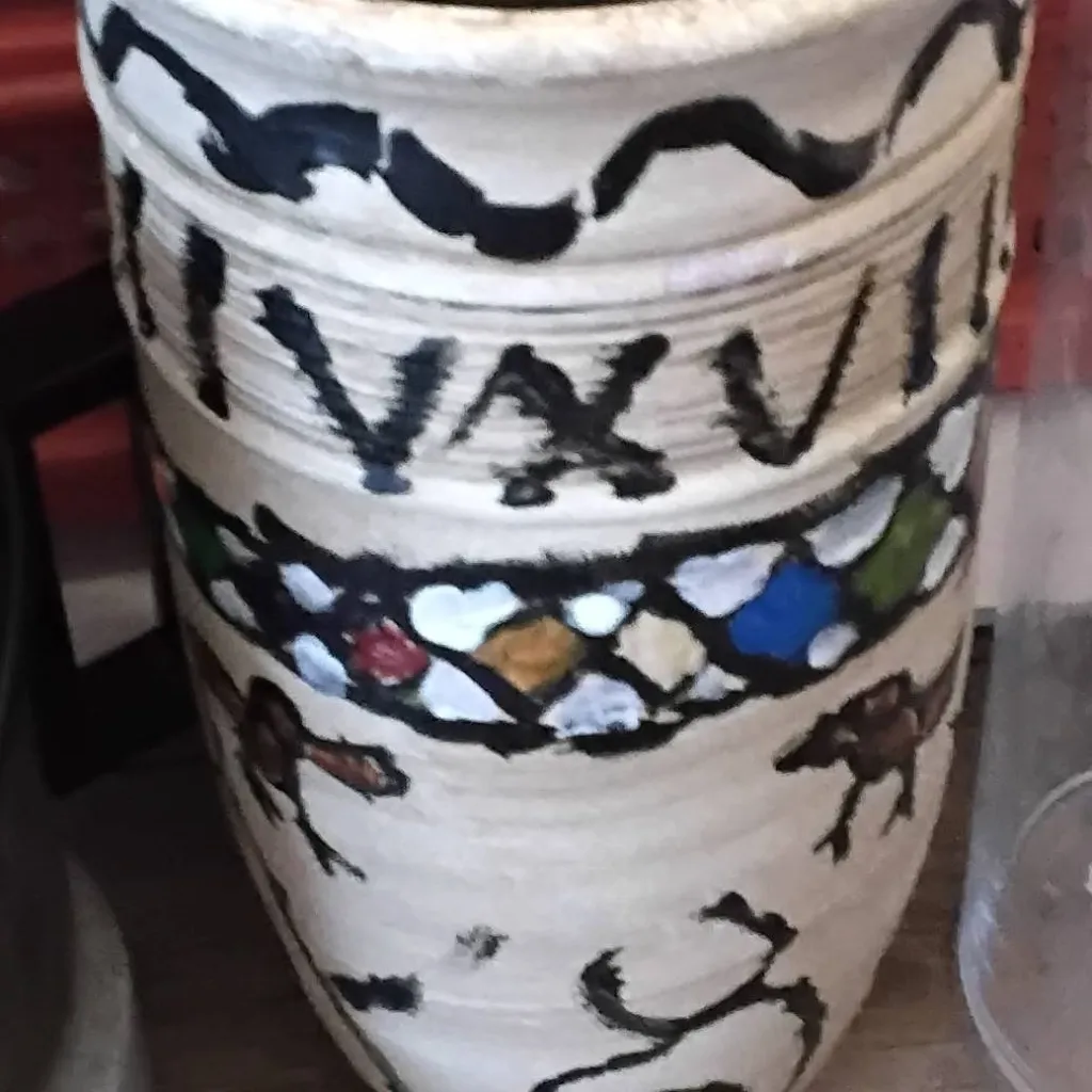 chat with ai character: Egyptian vase