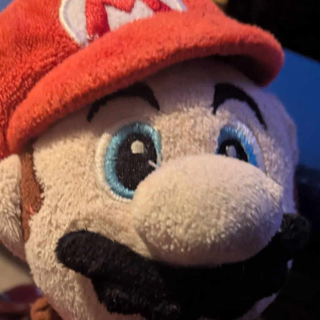 chat with ai character: Mario plush