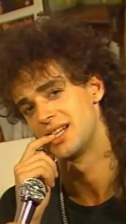 ai character: Gustavo cerati background