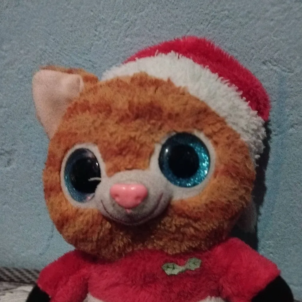 chat with ai character: gato de Natal