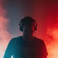 chat with ai character: Cool DJ guy