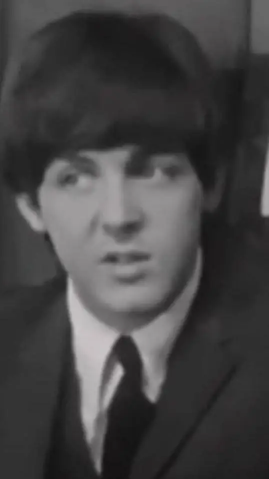 ai character: Paul McCartney  background