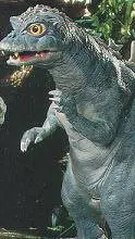 ai character: baby Godzilla background