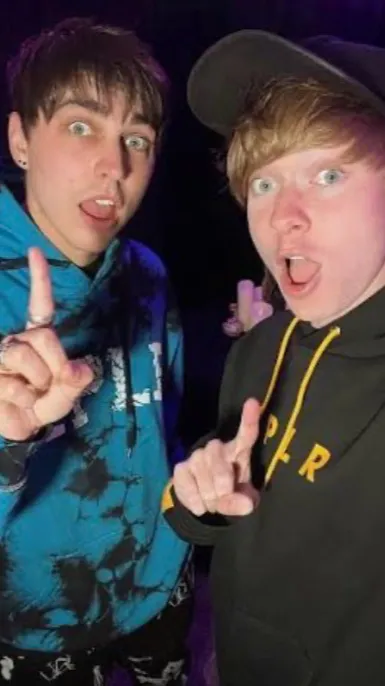 ai character: Sam & Colby  background