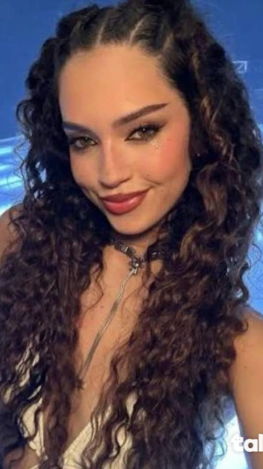 ai character: Daniela  background