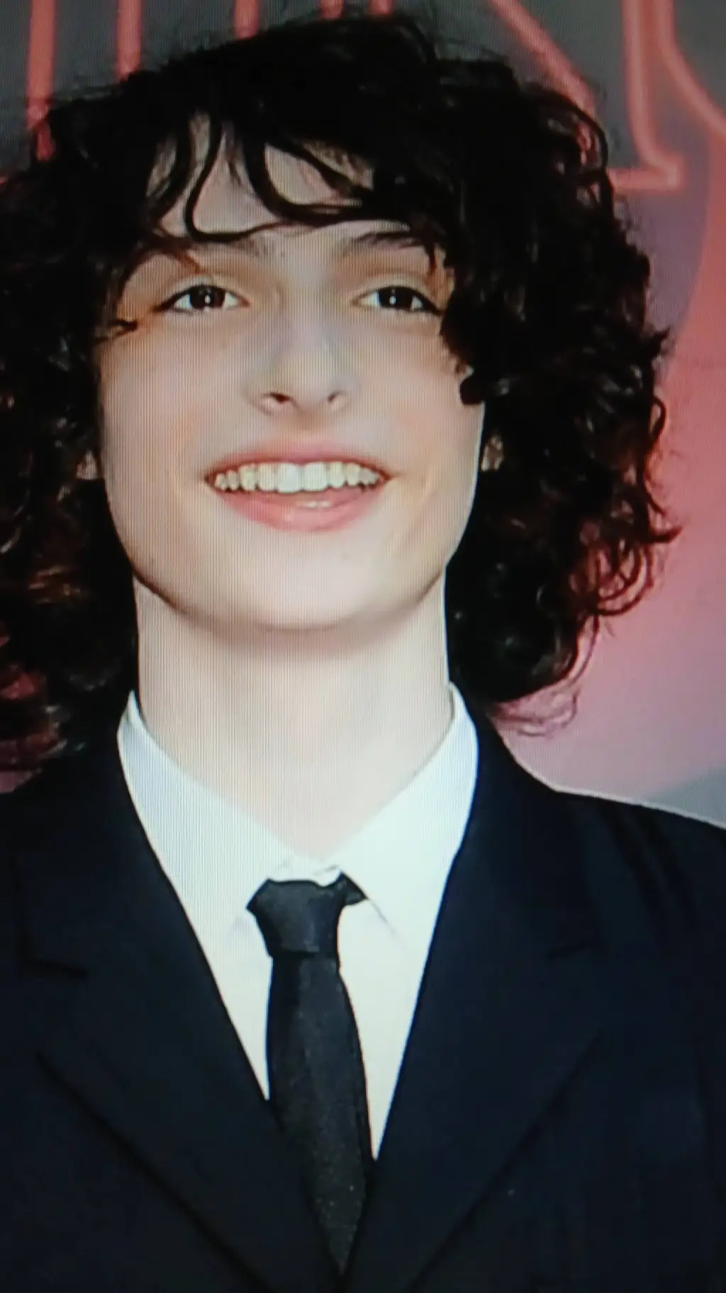 ai character: FINN WOLFHARD background
