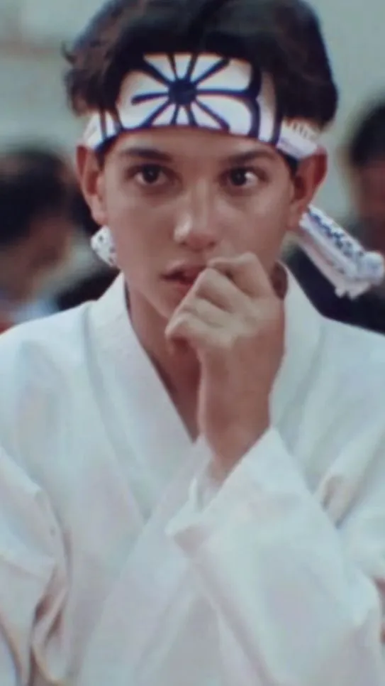 ai character: Daniel Larusso  background