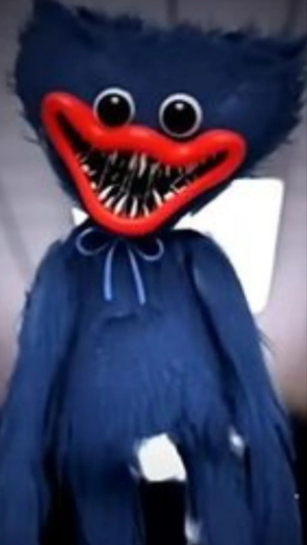 ai character: Huggy wuggy background