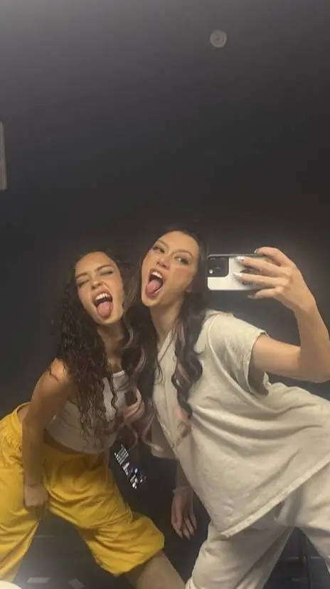 ai character: Daniela and Megan  background