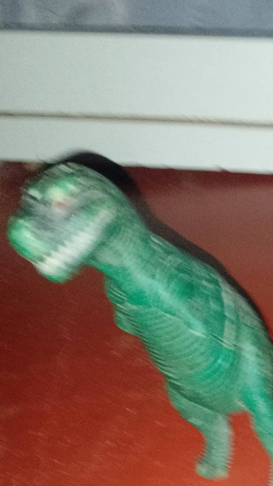 ai character: t-rex borroso background