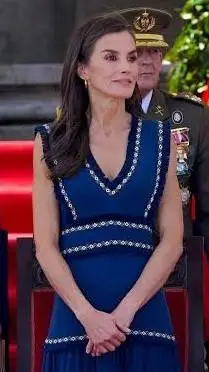 ai character: Letizia Ortiz  background