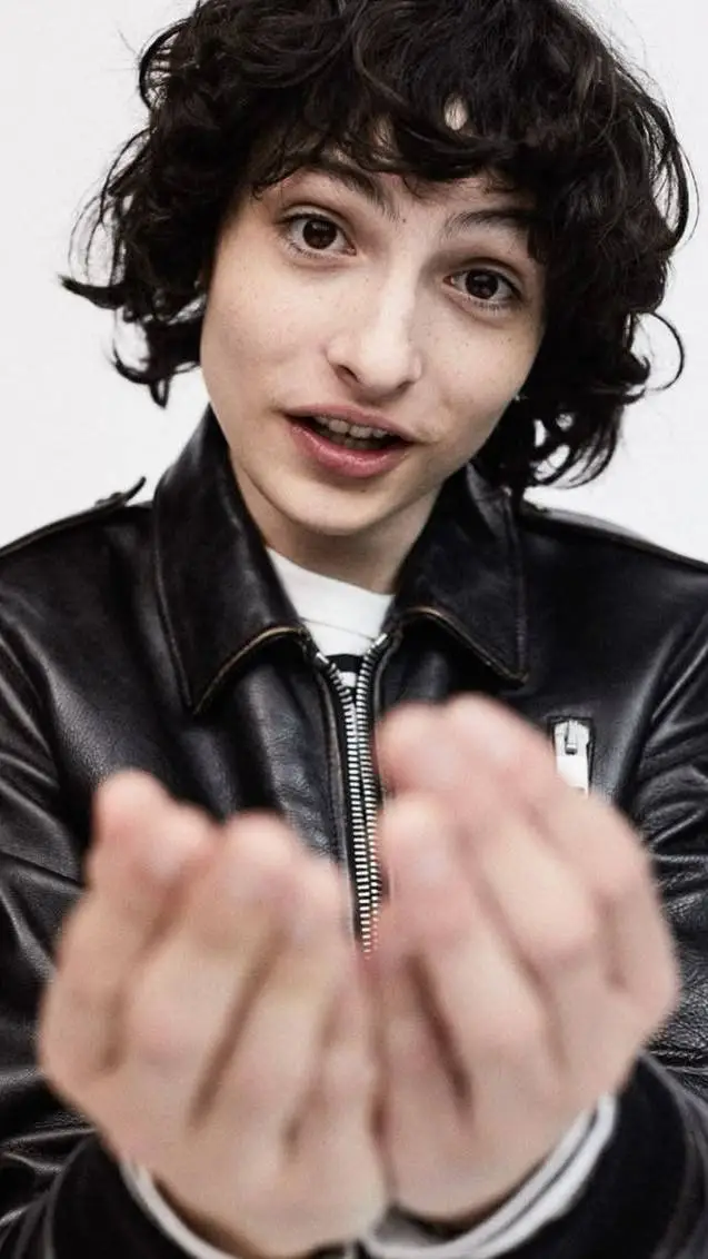 ai character: Finn Wolfhard  background