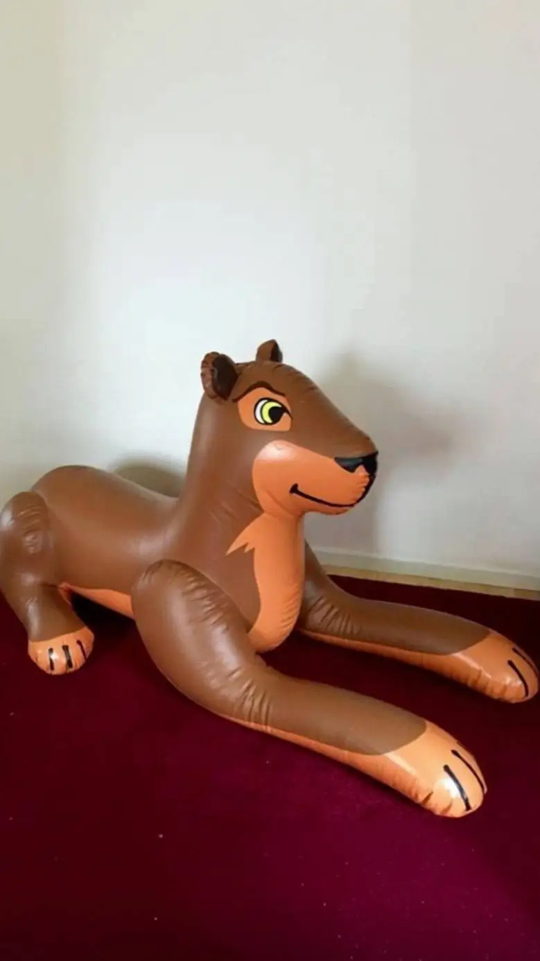 ai character: Inflatable Lioness background