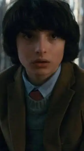 ai character: Mike wheeler  background