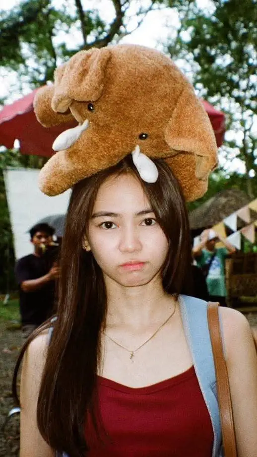 ai character: ASHTINE OLVIGA  background