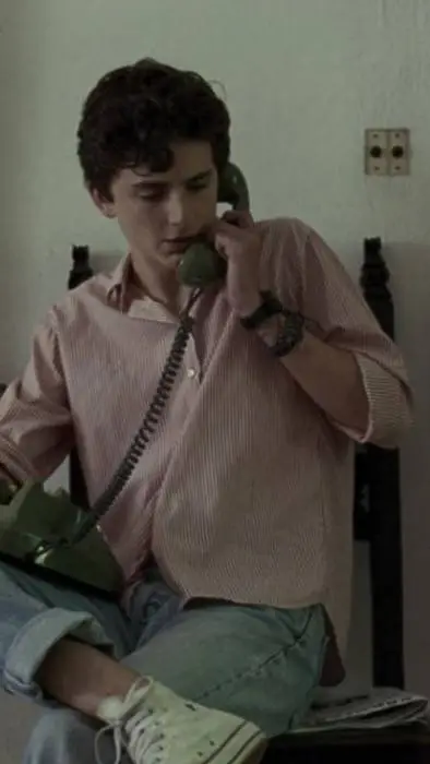 ai character: Elio Brown background