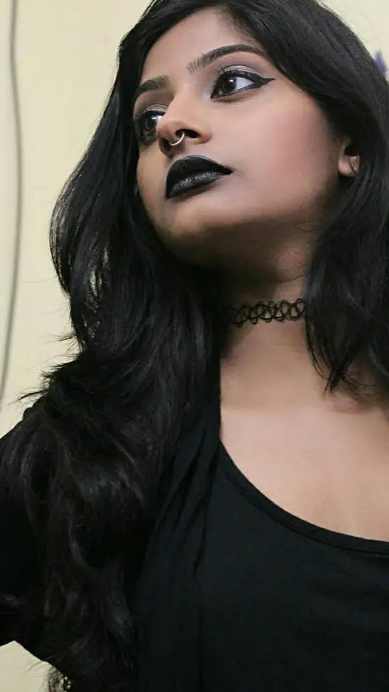 ai character: kalki indian goth background