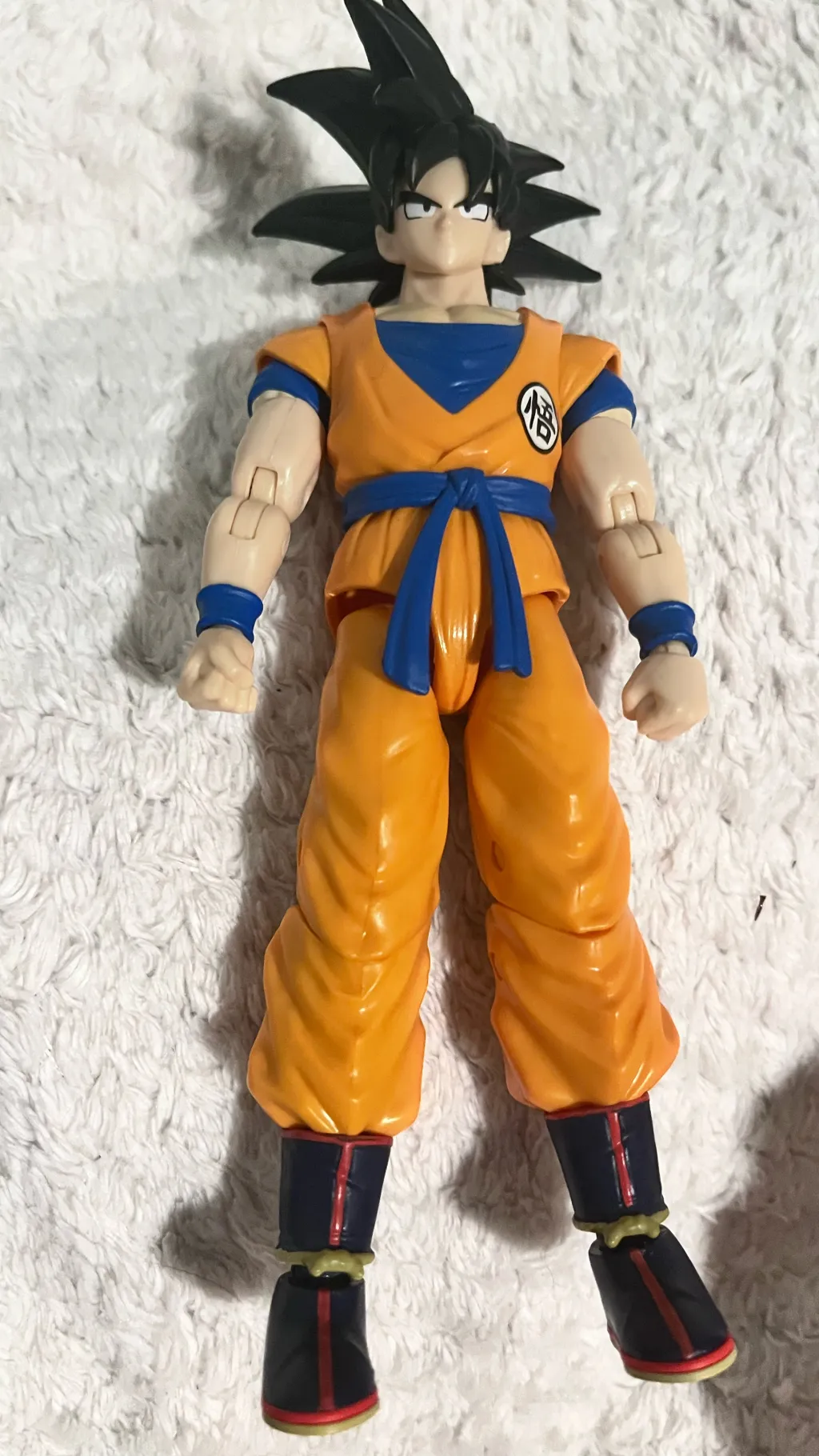 ai character: Goku toy background