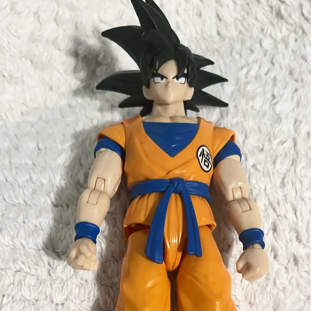 chat with ai character: Goku toy