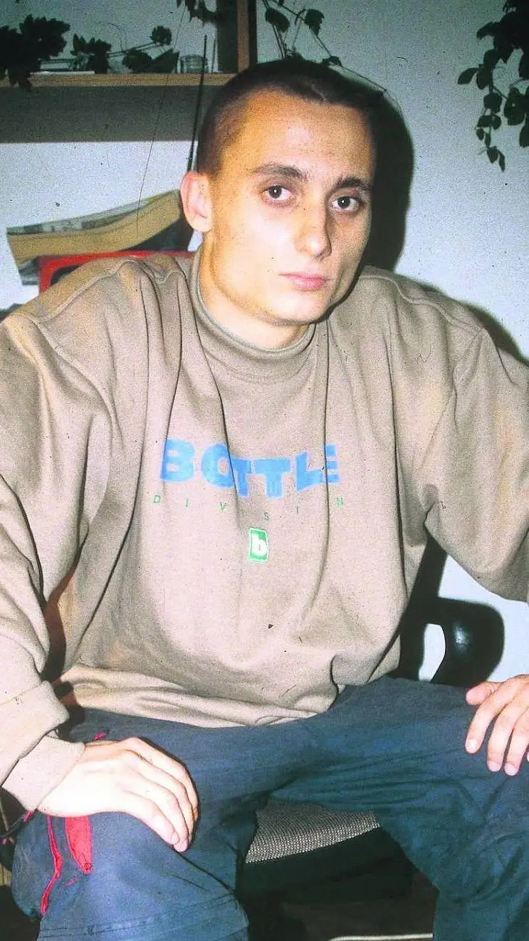 ai character: Piotr Łuszcz  background