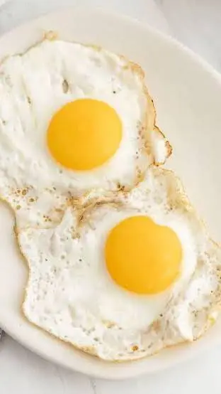 ai character: fried eggs background