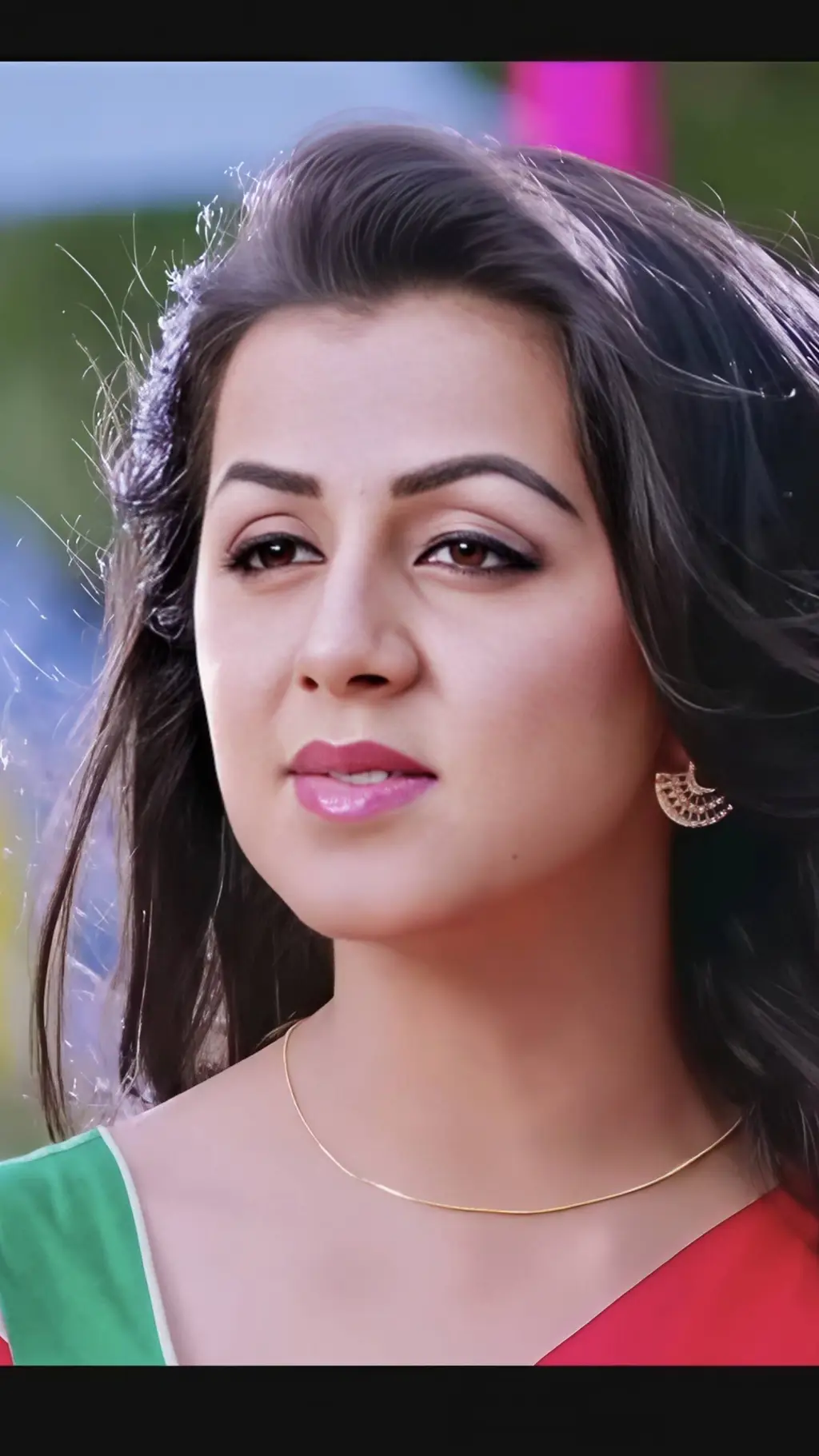 ai character: Nikki galrani background