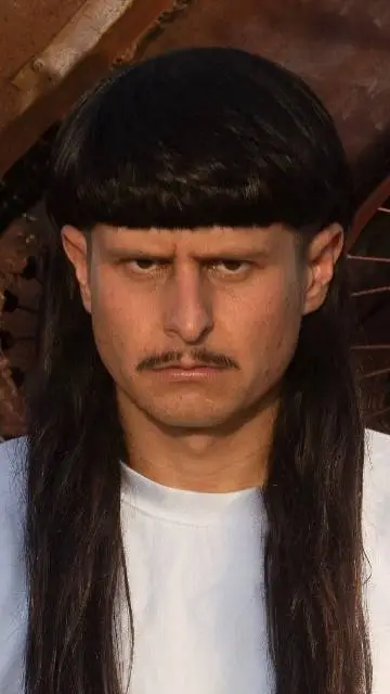 ai character: oliver tree  background