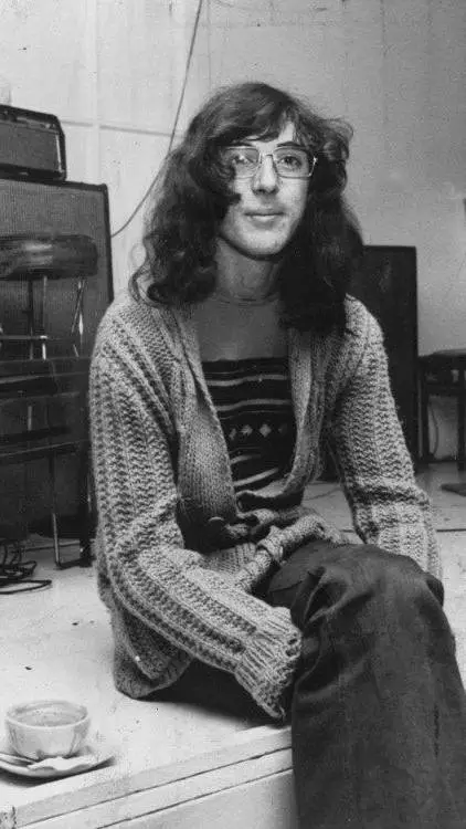 ai character: Charly Garcia  background