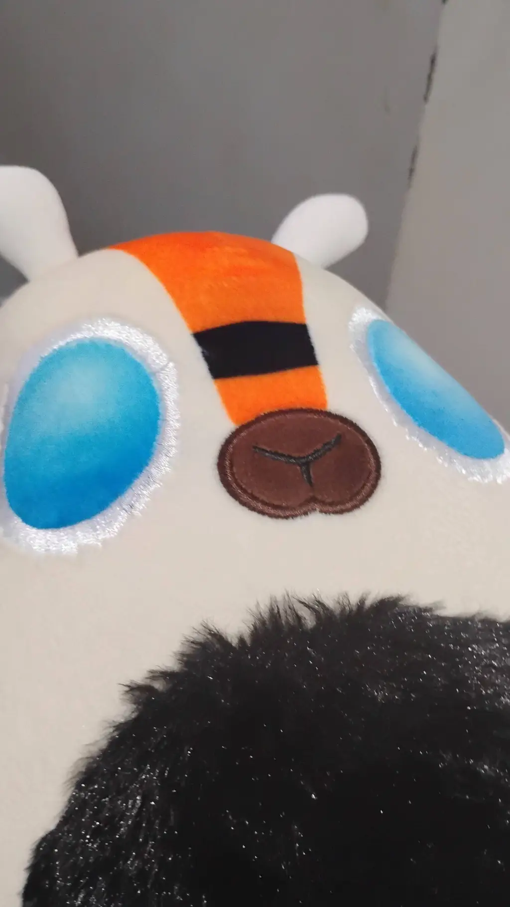 ai character: mothra squishmallo background