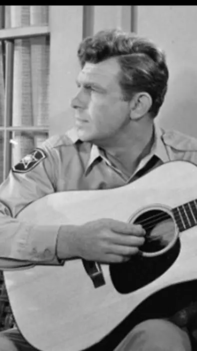 ai character: Andy Griffith  background
