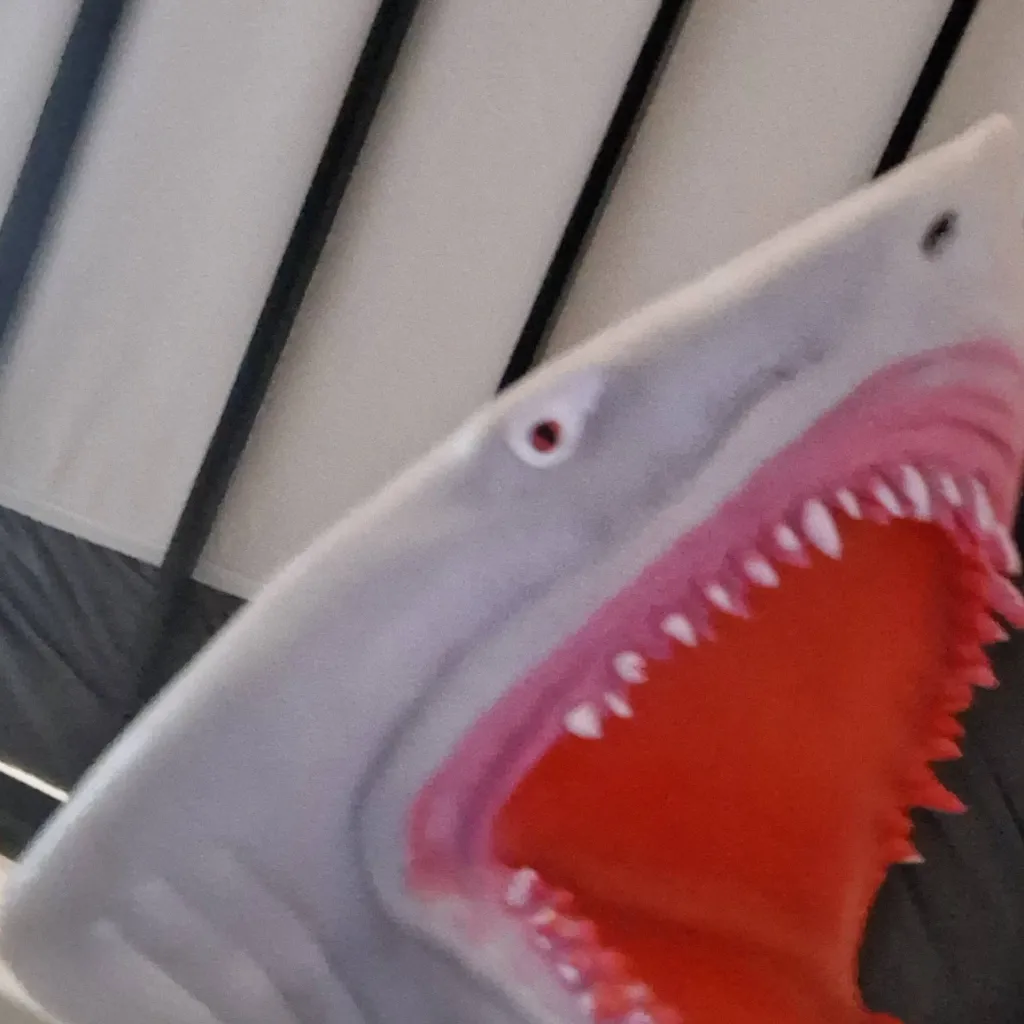 chat with ai character: shark puppet