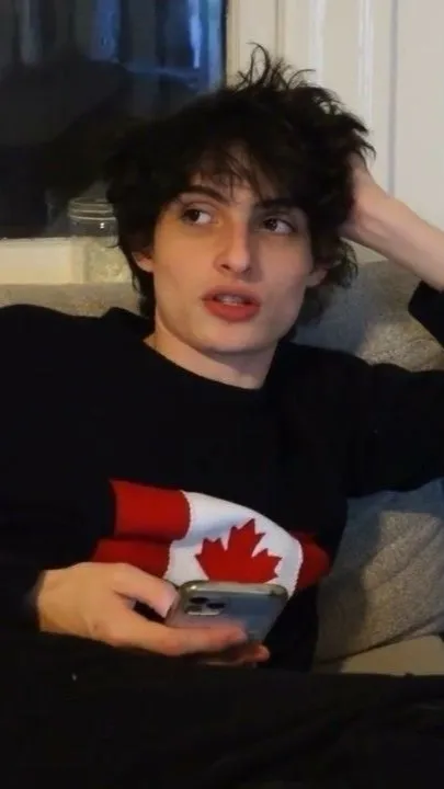 ai character: Finn Wolfhard  background