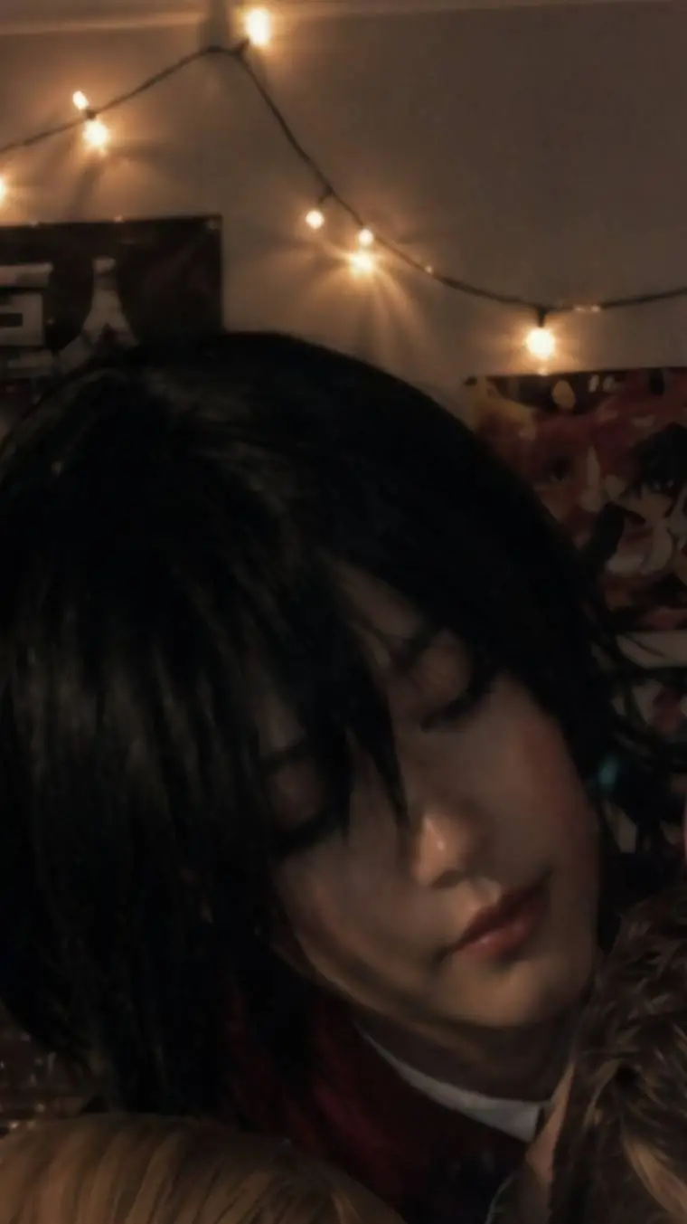 ai character: mikasa cosplayer background