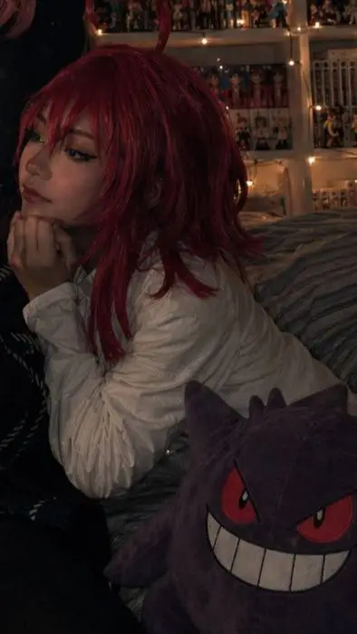ai character: kusuri cosplayer background