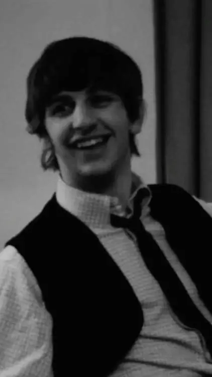 ai character: Ringo starr  background
