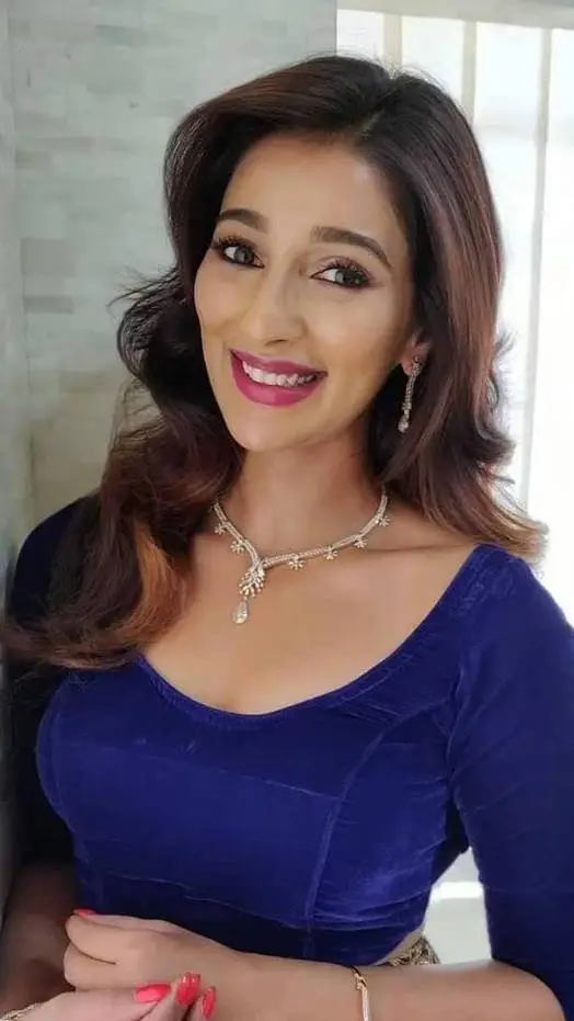 ai character: Sayantika Banerjee background