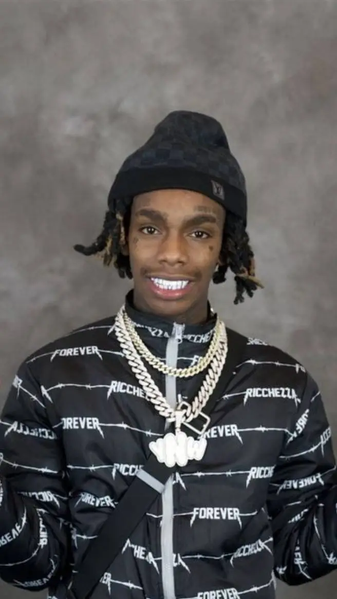 ai character: Ynw melly background