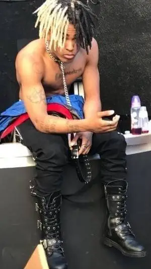 ai character: xxxtention jah background
