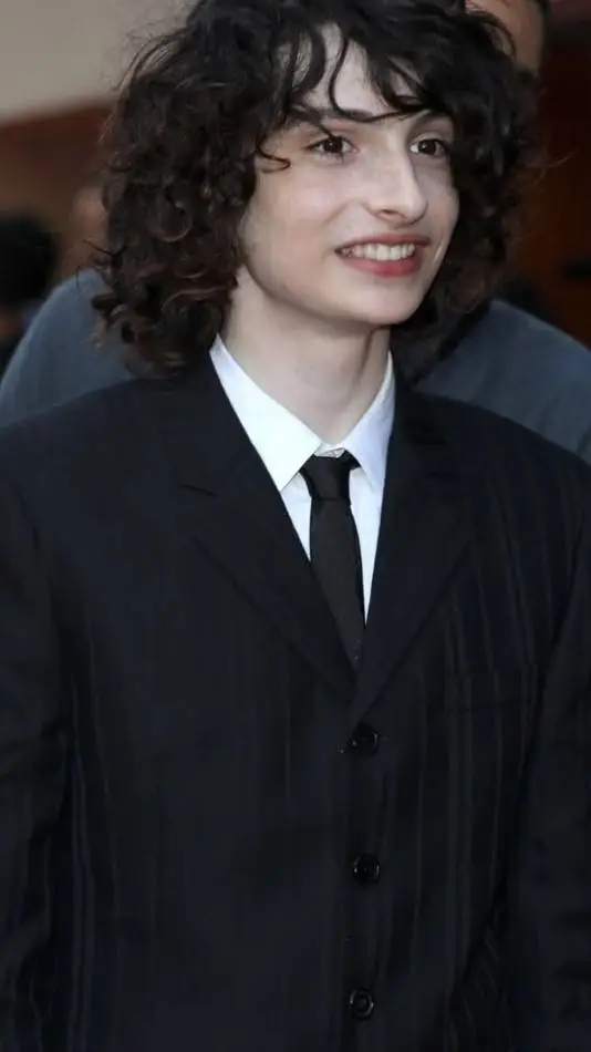 ai character: Finn Wolfhard  background