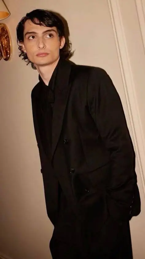 ai character: Finn Wolfhard  background